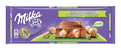 Mondelez Milka Whole Hazel Nuts Chocolate, 300g - "Whole Hazelnut Bliss!"