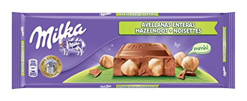 Mondelez Milka Whole Hazel Nuts Chocolate, 300g - "Whole Hazelnut Bliss!"