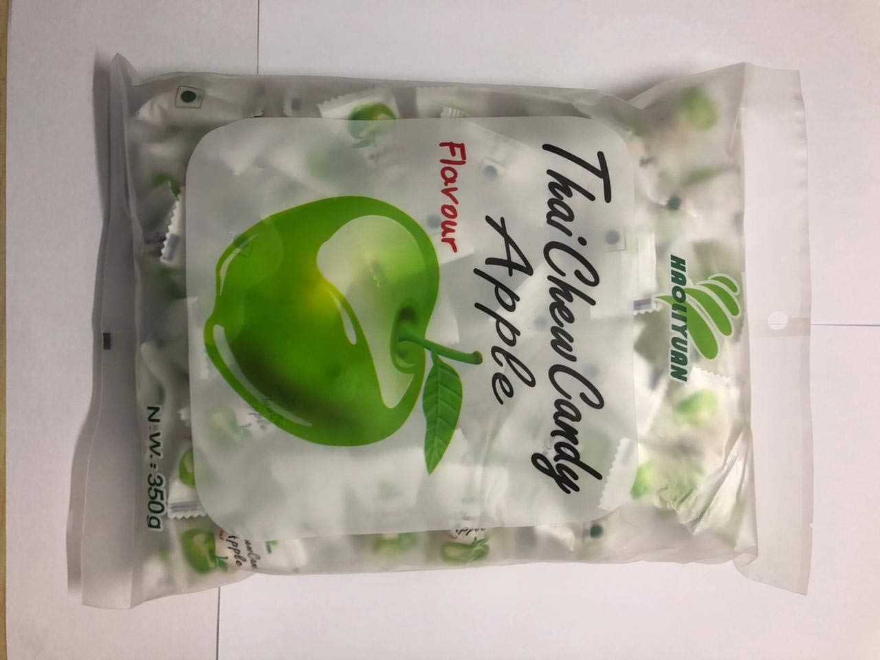 Haoliyuan Thai Chew Candy Apple 350g (appx. 100pcs) - Apple flavored chew candy, approximately 100 pieces per pack.