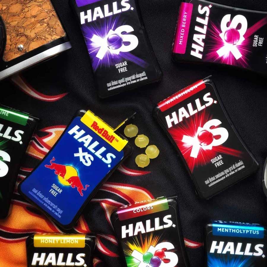 Halls XS Flavored Sugar Free Candy 13.8g Each - Pack of 12 (Mentho Lyptus) - Menthol and eucalyptus in a sugar-free formula.